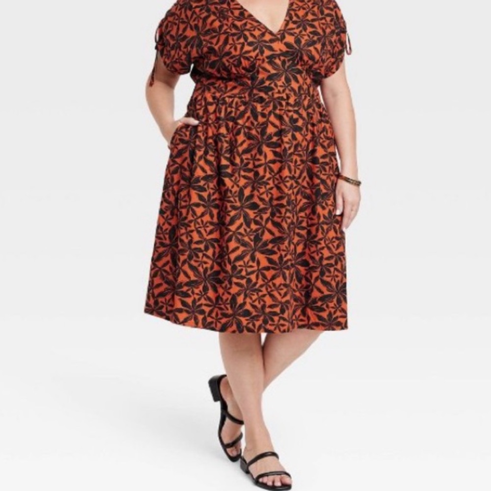 Women’s orange and navy floral midi dress
